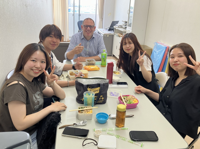 Enjoying chatting in English while having lunch