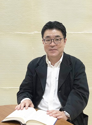 山田 哲也